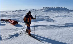 sledder on sea ice